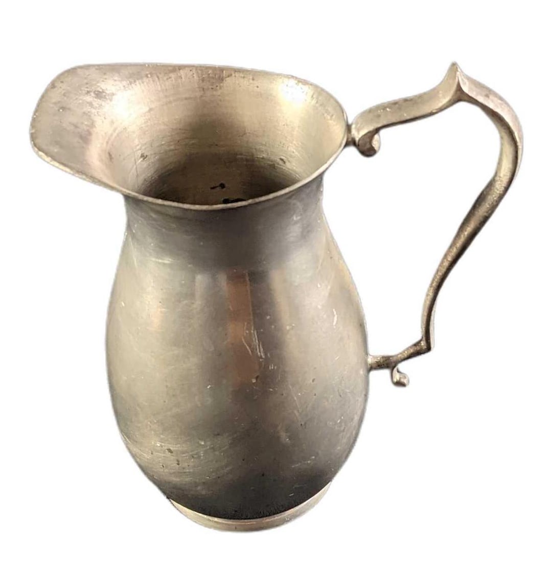 Vintage Woodbury Marked Pewter Pitcher: Vintage Woodbury Marked Pewter Pitcher. Is approx 6" x 3" x 7" and it weighs under one pound at 0.90lb. The pitcher is in a good, vintage condition with wear and scratches. Please see the