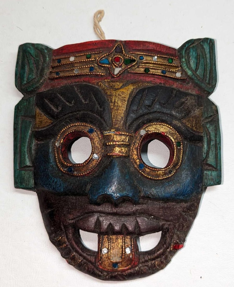Vintage Tribal Style Demon Wall Art Mask: Vintage Tribal Style Demon Wall Art Mask. This is approx 6 1/2" x 3/4" x 7 1/2" and it weighs 0.31lb. The wooden mask has some chips and cracks. Please see the images as they are part of t