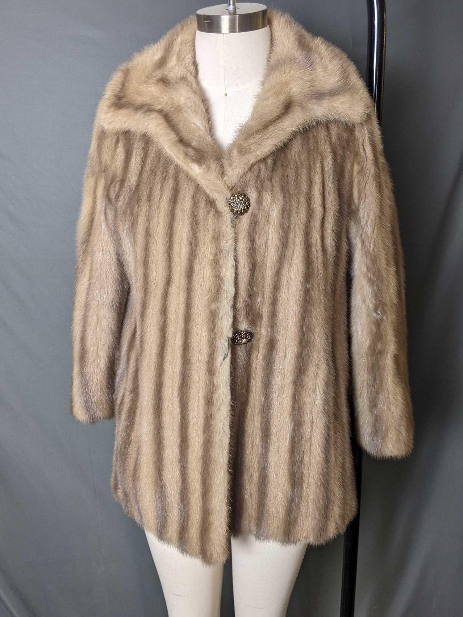 Authentic Fur Coat Fitch Fur Coat Lisal Melbourne: Authentic Fur Coat Fitch Fur Coat This luxurious vintage fur coat is made of real fitch fur. The coat brand is labeled 'Lisal Melbourne' horizontally on the lower right. This coat has some bro