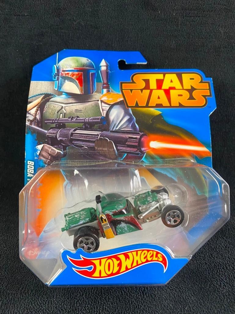 Boba Fett Hot Wheels Star Wars Car New in Box: Boba Fett Hot Wheels Star Wars Car New in Box Special edition Star Wars Hot Wheels hot rod, featuring Boba Fett. In good condition, in the original unopened packaging. From the 2014 series. Approxim