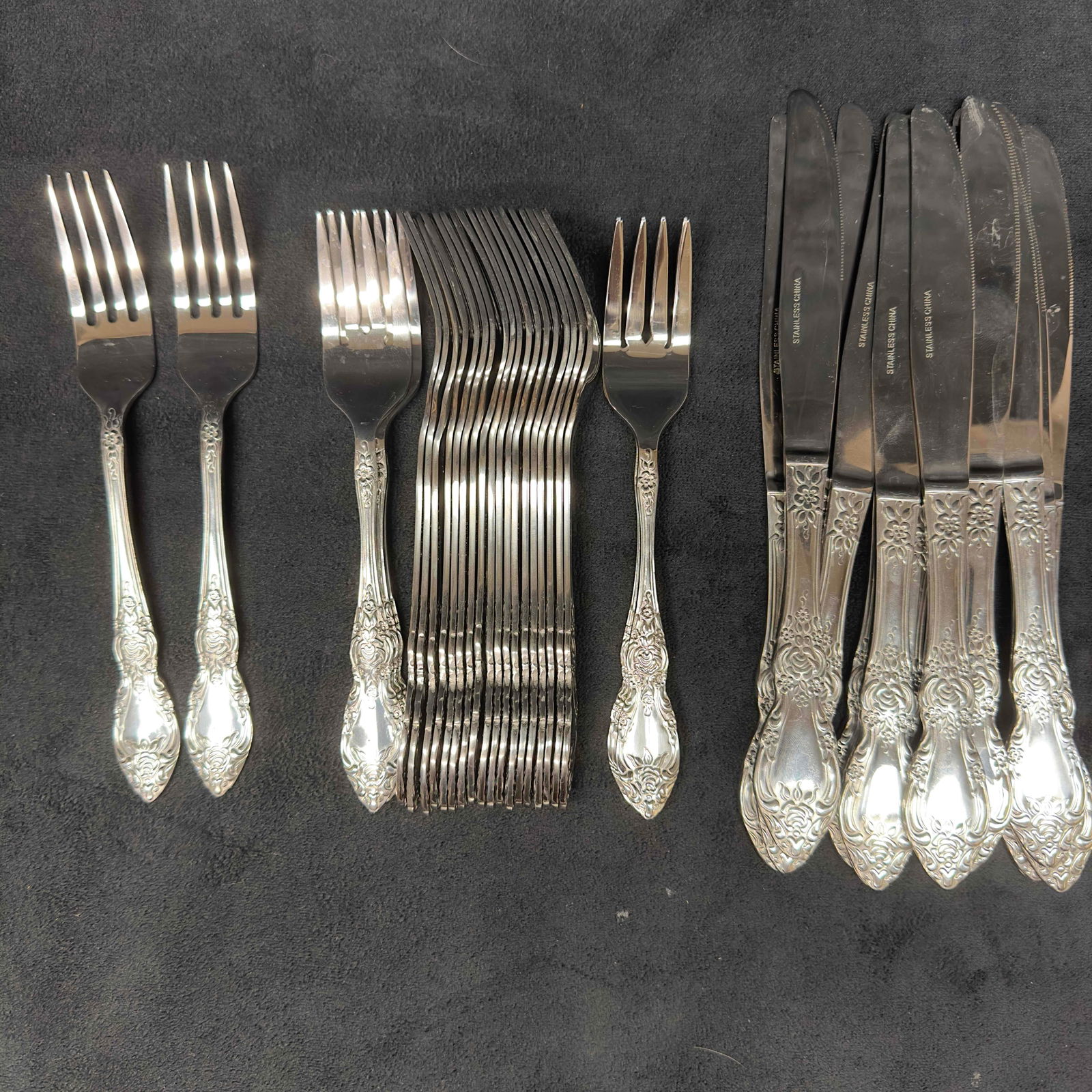 Stainless Steel Silverware Floral Rose Flatware Lot of 58 Fifty Eight Forks Spoons Kitchenware: Stainless Steel Silverware Floral Rose Flatware Lot of 58 Fifty Eight Forks Spoons Kitchenware. This silverware set includes 58 pieces of flatware. Each handle features a floral rose design and made b