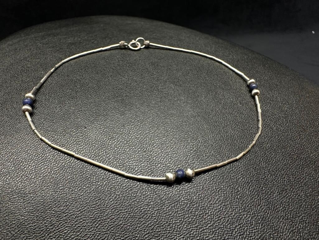 Sterling Silver Lapis Lazuli Anklet: This piece of jewelry has been tested and researched prior to listing. Please view all our pictures they are part of our description. DETAILS: Metal - Sterling Silver Color - Silver Stones - Lapis La