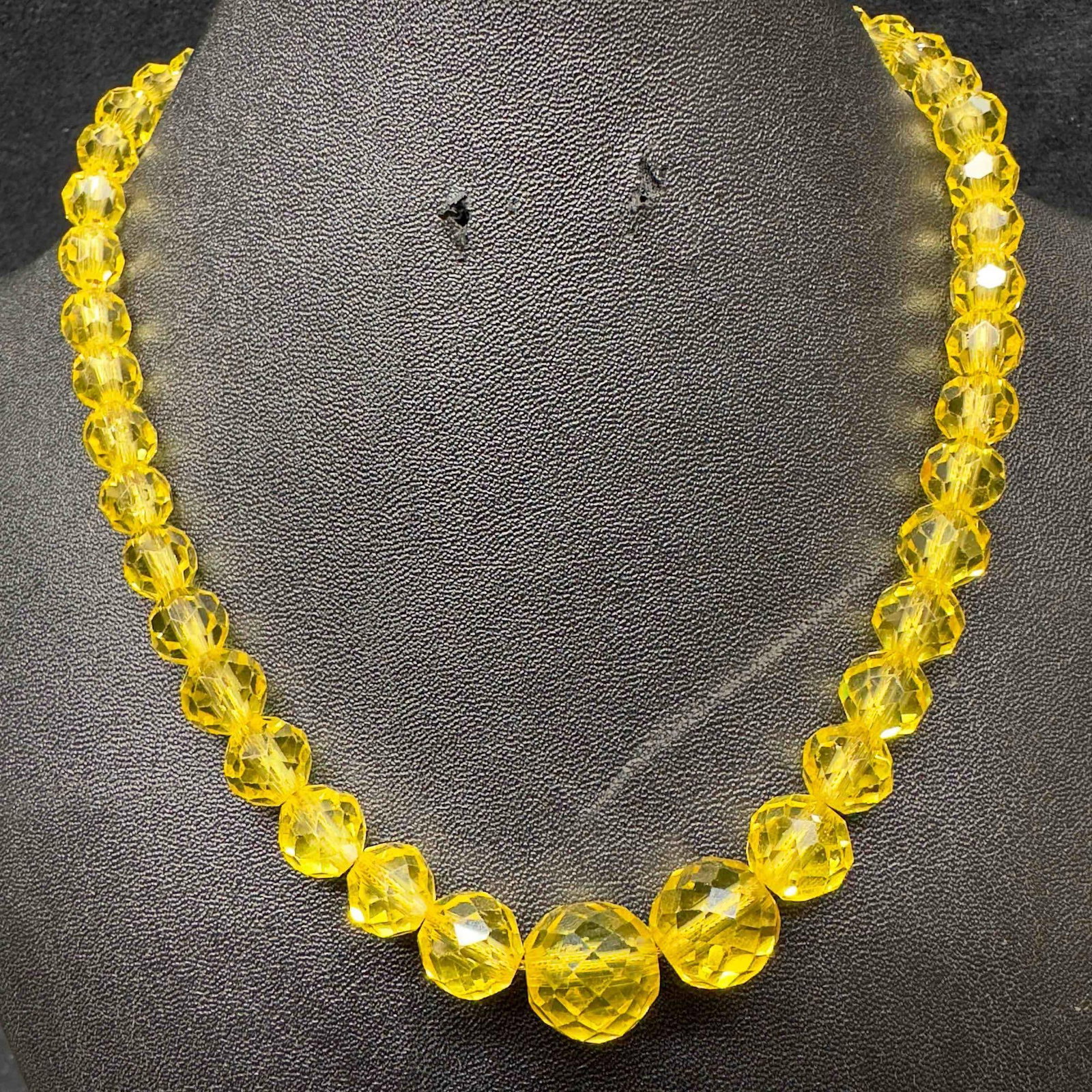 Venetian Murano Art Glass Lamp Work Yellow Clear Beaded Necklace E51: Venetian Murano Art Glass Lamp Work Yellow Clear Beaded Necklace E51. Necklace with clear yellow colored glass beads with beautiful designs on each. The necklace features a spring ring clasp closure. 