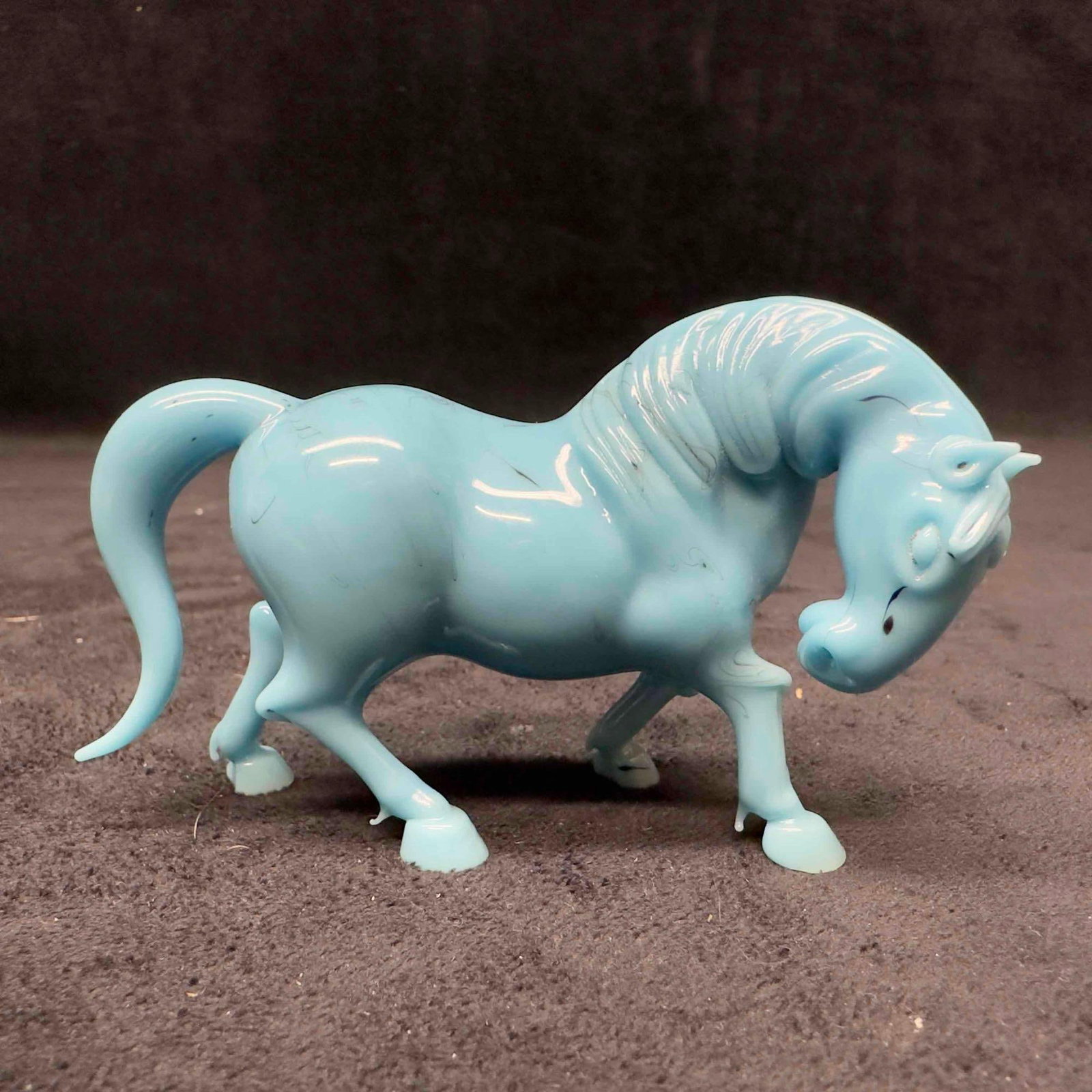 Turquoise Chinese Peking Glass Horse Figurine In Trotting Gallop Pose Light Blue Figure: Turquoise Chinese Peking Glass Horse Figurine In Trotting Gallop Pose Light Blue Figure. Beautiful turquoise light blue colors featured in this glass piece. Unknown maker no identifying markings. No c