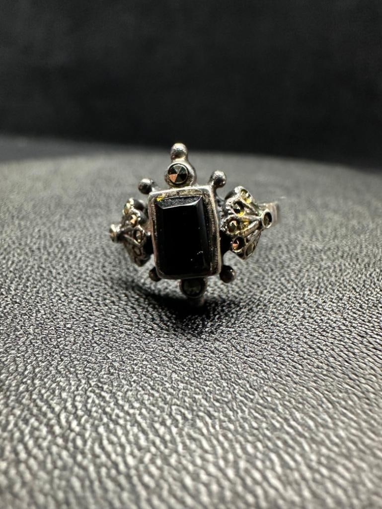 Vintage Sterling Marcasite Onyx Ring: This piece of jewelry has been tested and researched prior to listing. Please view all our pictures they are part of our description. DETAILS: Metal - Sterling Silver Color - Silver Stones - Onyx, Mar