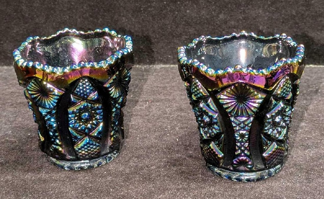 2 Vintage Carnival Iridescent Glass Toothpick Holders: 2 Vintage Carnival Iridescent Glass Toothpick Holders. Each is approx 2 1/2" x 2 1/2" x 2 1/2" and the total weight is 0.53lb. Both of the glasses have no chips or cracks.