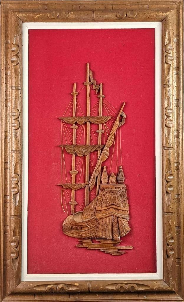 Framed Mid Century Wood Carved Boat With Red Velvet Background A: Framed Mid-Century Wood Carved Boat With Red Velvet Background A. By Han Palace Art. Is approx 23 1/2" x 2" x 39" and it weighs 8lbs. Is in a good, vintage condition with wear and torn bac