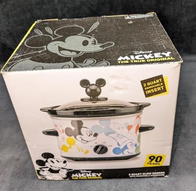 Disney Mickey Mouse 2 Quart Slow Cooker NIB: Disney Mickey Mouse 2 Quart Slow Cooker NIB. This comes in the original box that is approx 9" x 7 1/2" x 9" and it weighs 5.20lbs. The book has some shelf wear and the slow cooker is still wrapped up 