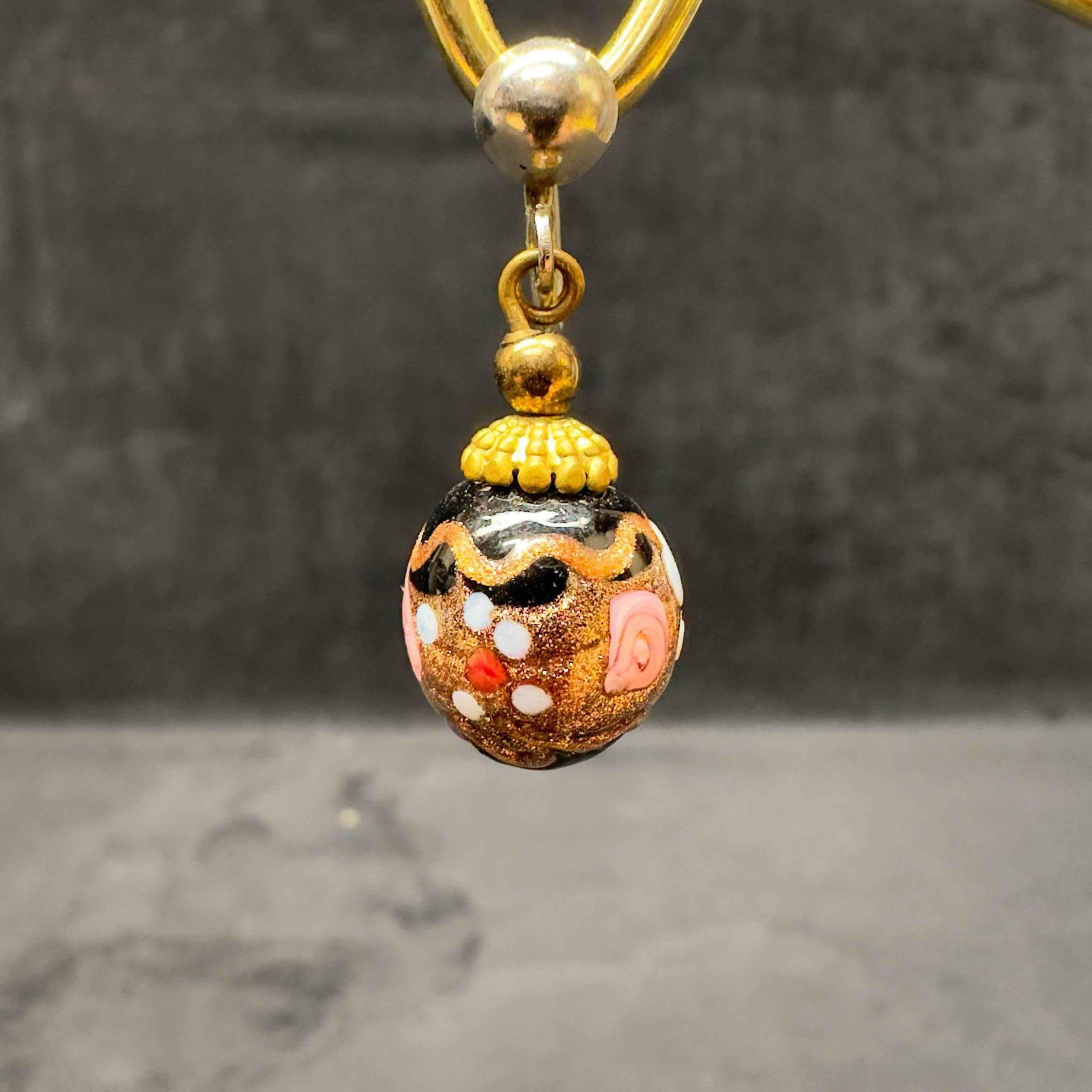 Murano Venetian Art Glass Lamp Work Round Bead Black Copper Accent Dangle Earrings D67: Murano Venetian Art Glass Lamp Work Round Bead Black Copper Accent Dangle Earrings D67. Earrings with black glass beads with beautiful designs on each. The earrings feature copper colored and floral a