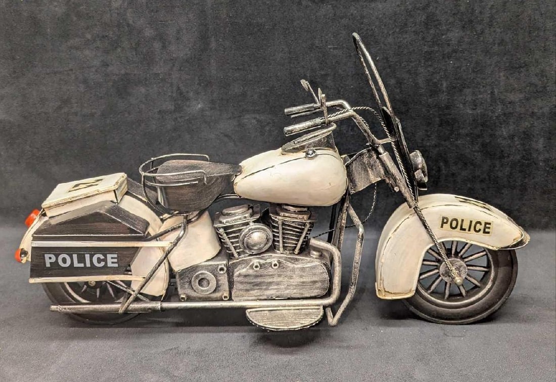 Vintage Metal Replica Model Police Bike: Vintage Metal Replica Model Police Bike. This is a very detailed hand painted model of a twin cylinder police motorcycle. The maker and date of creation is unknown. This is approx 17" x 6" x 10" and i