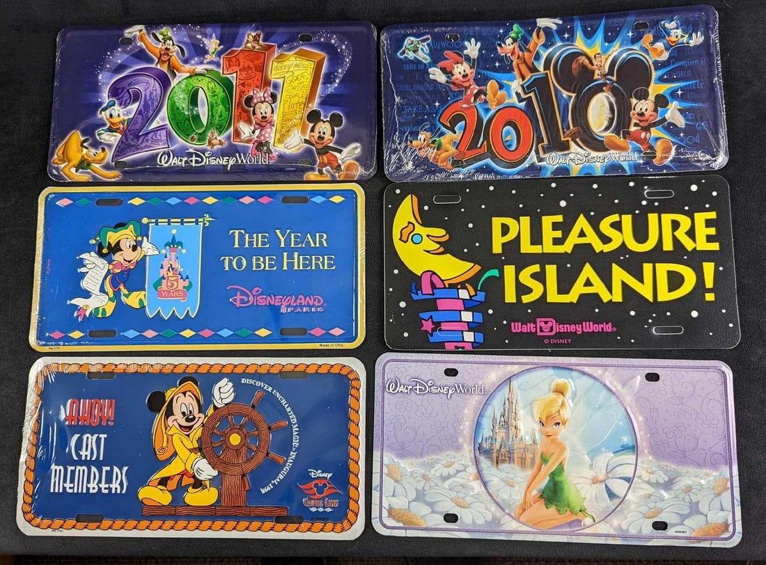 6 Walt DIsney License Plates Disney Tinkerbell: This lot includes six different Disney Parks front license plates, including: (1) Wrapped Ahoy! Cast Members. Cast Exclusive Disney Cruise Line. (1) Magic Kingdom Tinkerbell. (1) Wrap