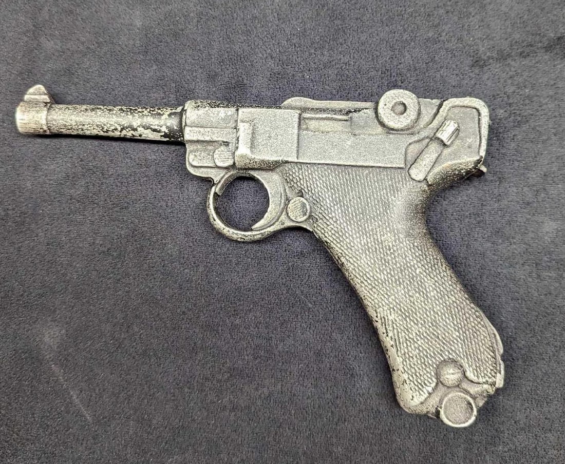 Vintage Metal Luger Pistol Prop Gun: Vintage Metal Luger Pistol Prop Gun. This solid metal replica was made to exact scale and detail and cannot be made to fire. The prop gun is approx 8" x 1" x 5" and it weighs 1.34lb. The prop gun