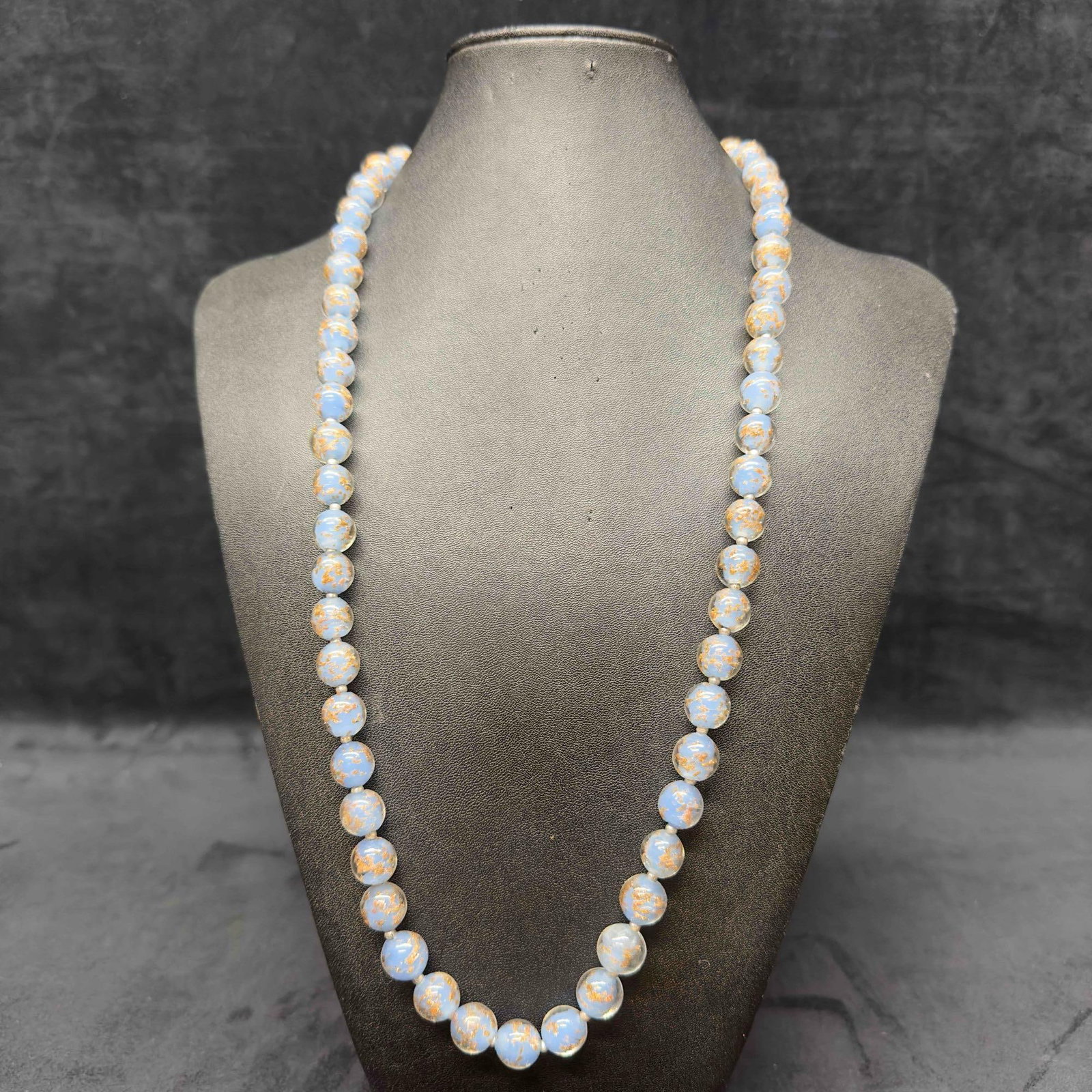 Murano Venetian Glass Lamp Work Bead Light Baby Blue Copper Accent Beaded Necklace B21: Murano Venetian Glass Lamp Work Bead Light Baby Blue Copper Accent Beaded Necklace B21. Necklace with baby blue colored glass beads with beautiful designs on each. The necklace features copper colored