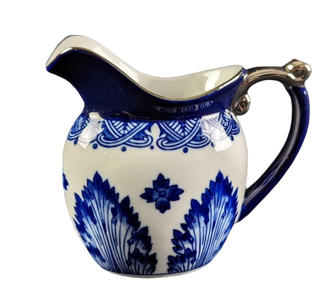 Bomba Fine China Blue & Platinum Mini Pitcher: Would make a good creamer and even a flower pot as well. This is approx 5" x 2 1/2" x 4 1/2 and it weighs 0.45lb. The mini pitcher is in a good, unused condition with no chips or cracks. Please see th