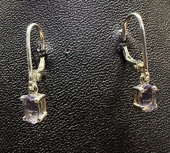 Sterling Silver Oval Tanzanite Earrings: This piece of jewelry has been tested and researched prior to listing. Please view all our pictures they are part of our description. DETAILS: Metal - Sterling Silver Color -Silver Stones - Tanzanite 