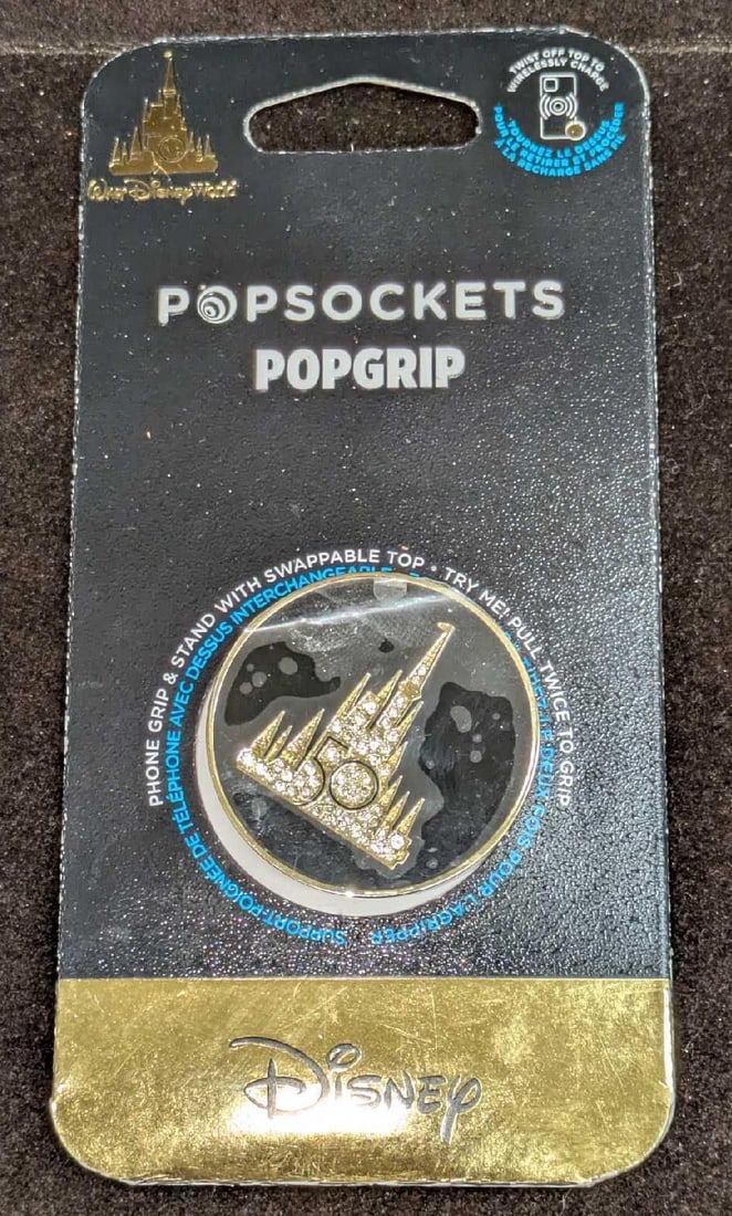 Disney 50th Anniversary Phone Popsockets Popgrip B: Disney 50th Anniversary Phone Popsockets Popgrip B. New In package. This is approx 2 3/4" x 1/4" x 5 3/4" and it weighs 0.06lb. The Popgrip has never been removed from its package. Popgrip