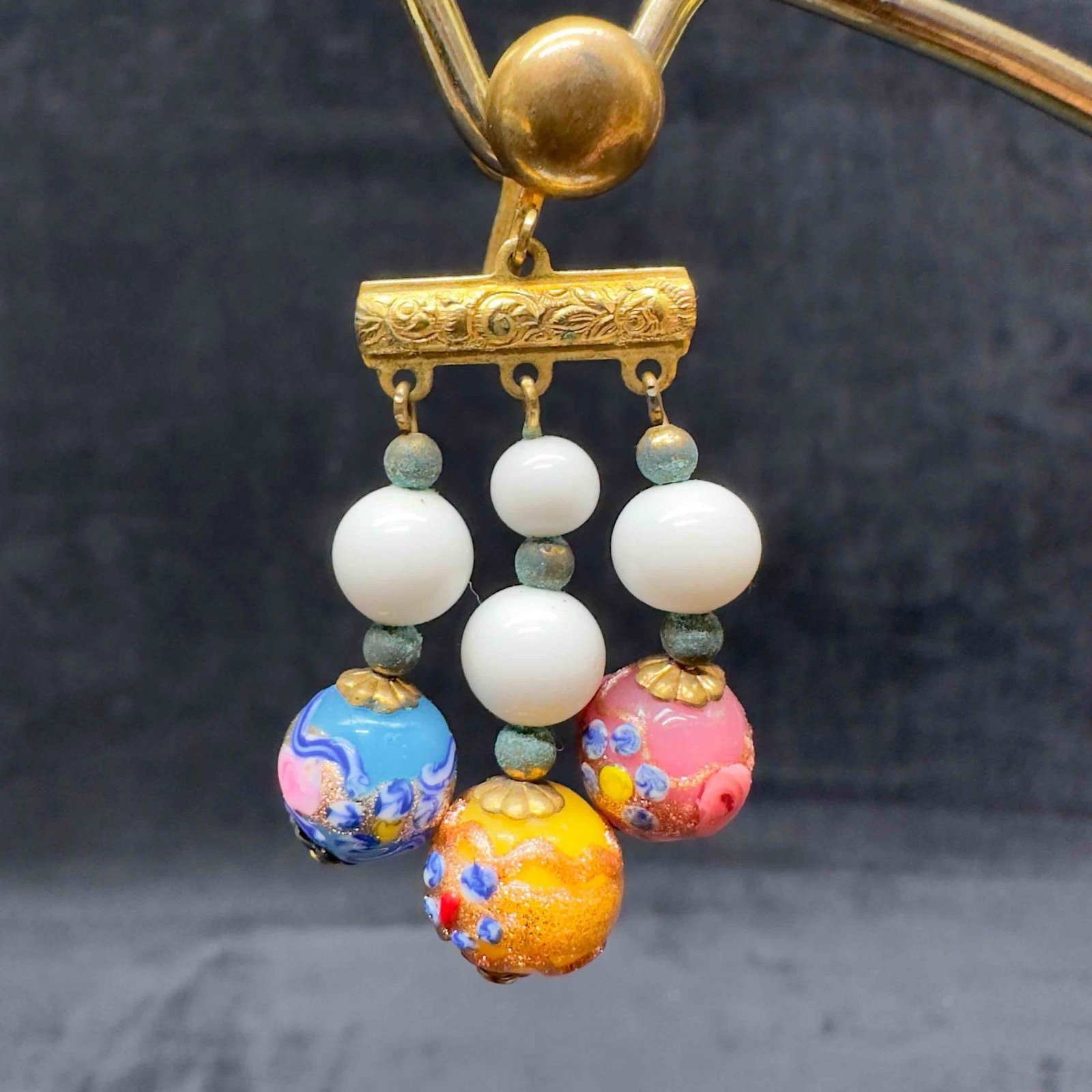 Murano Venetian Lamp Work Art Glass Three Bead Pink Yellow Blue Beaded Floral Earrings E50: Murano Venetian Lamp Work Art Glass Three Bead Pink Yellow Blue Beaded Floral Earrings E50. Earrings with pink, yellow, and blue colored glass beads with beautiful hand painted designs on each. The ea