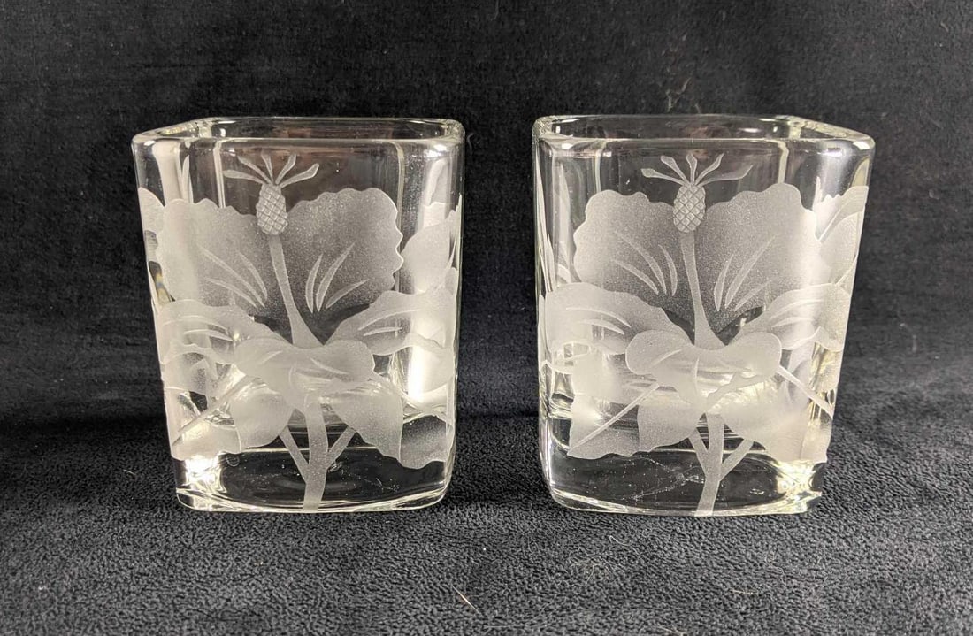 Glass Hibiscus Flower Design Cups/ Candle Holders: Glass Hibiscus Flower Design Cups/ Candle Holders These are in great condition with no known damage. These feature a clouded glass design of Hibiscus Flowers. These can be used as cups or even tea can