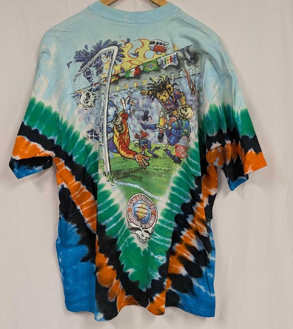 Liquid Blue Grateful Dead Dead Headers Shirt XL: Liquid Blue Grateful Dead Dead Headers Shirt XL. This shirt does not appear to have ever been worn. 100% Cotton. Please note, it does not come with the hanger seen in the image. Folded, the shirt is a