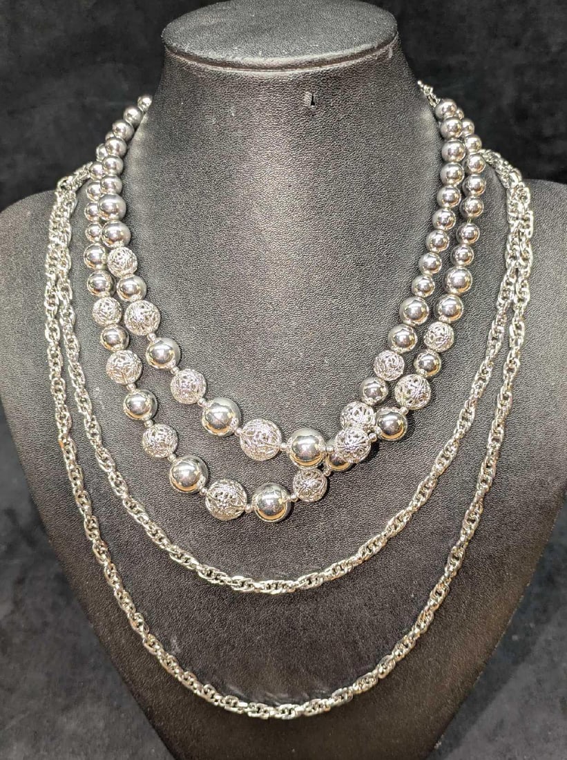 2 Vintage Coro And Unmarked Long Double Stand Silver Tone Necklaces: 2 Vintage Coro And Unmarked Long Double Stand Silver Tone Necklaces. This lot contains: (1) Silver Tone Long 51" Chain Necklace. Unmarked. (1) Coro Silver Tone Beaded Double Strand Necklace. Thi