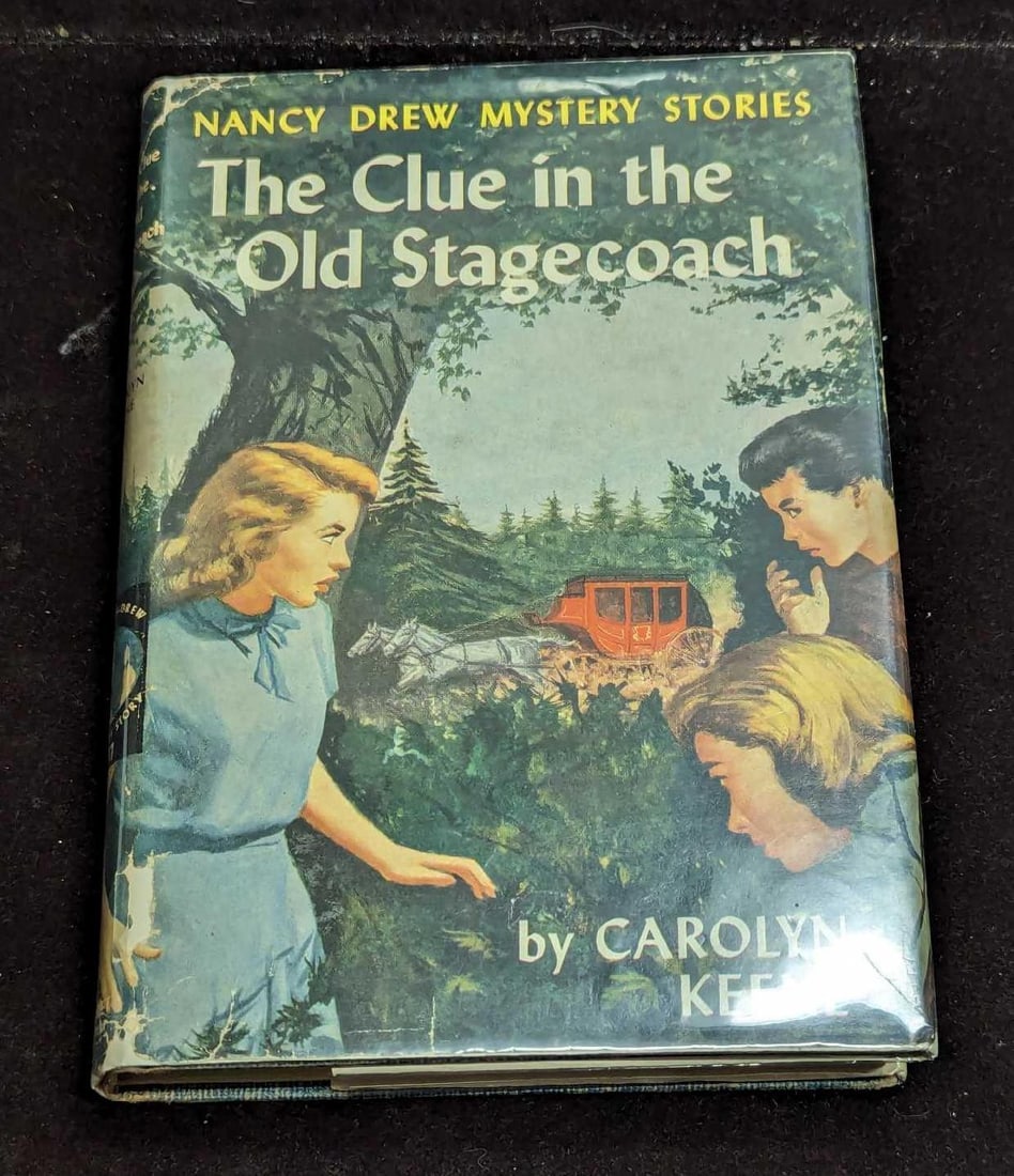 Nancy Drew #37 "The Clue In The Old Stagecoach" 1960 Dust Jacket First Edition: Nancy Drew #37 "The Clue In The Old Stagecoach" 1960 Dust Jacket First Edition. This is approx 5 1/4" x 3/4" x 7 5/8" and it weighs 0.58lb. The dust jacket has some shelf wear. This was written by Car
