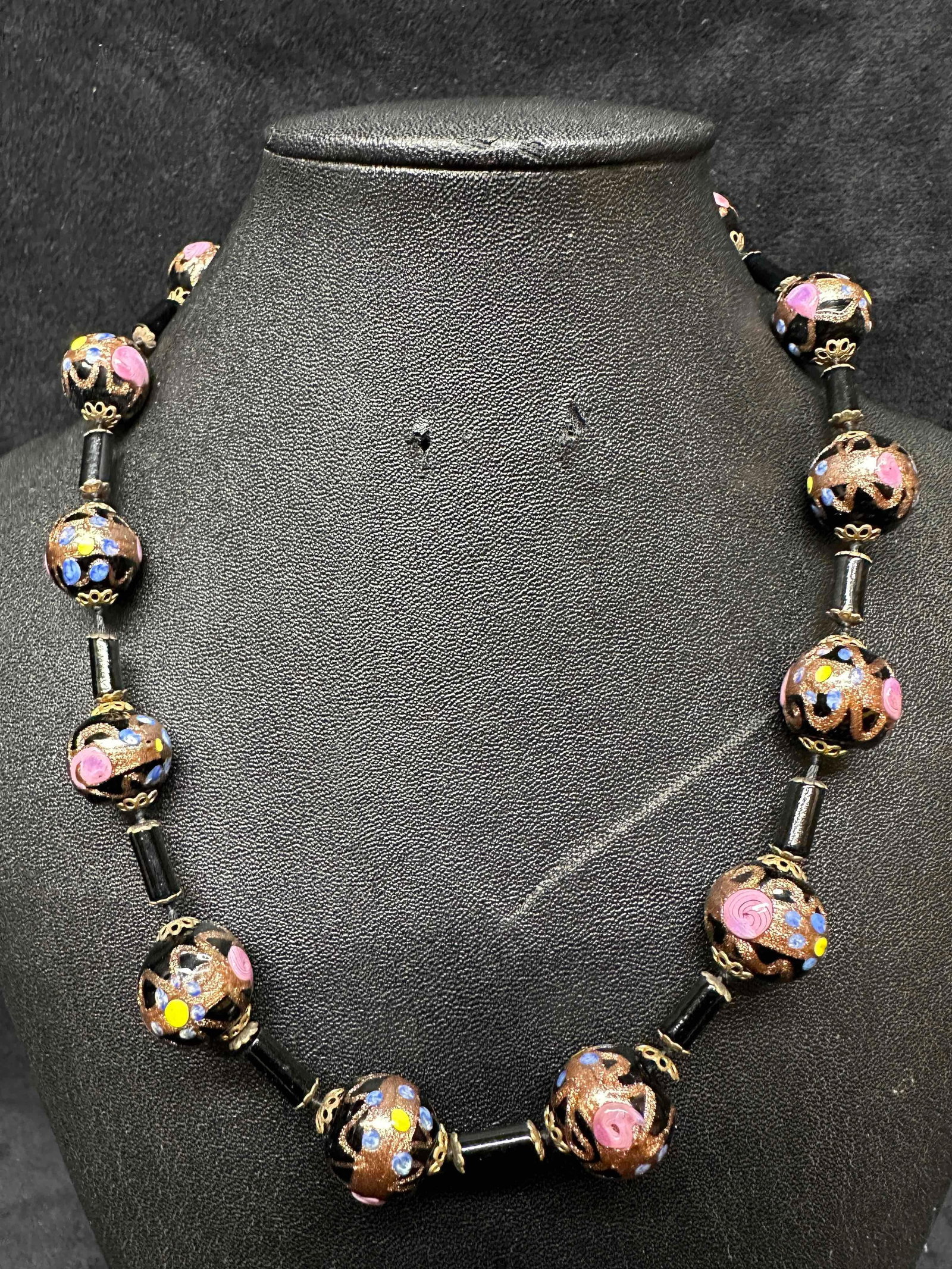 Murano Venetian Lamp Work Glass Bead Black Floral Copper Accents Beaded Necklace G65: Murano Venetian Lamp Work Glass Bead Black Floral Copper Accents Beaded Necklace G65. Necklace with black colored glass beads with beautiful hand painted floral designs on each. The necklace features 