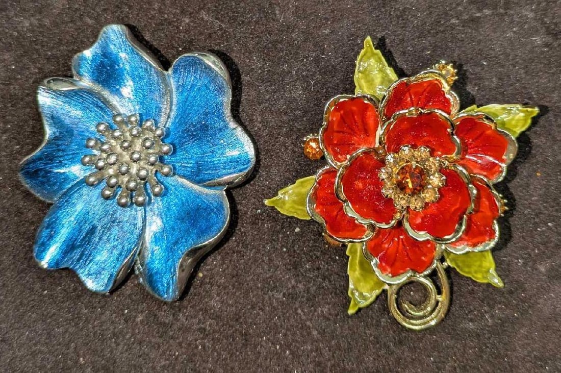Cora Enameled Flower Pin Brooches: Cora Enameled Flower Pin Brooches. This lot includes: (1) Coro Enameled Flower Brooch Pin. This is approx 2 1/2" x 2 3/4" x 1/2". (1) Blue Enameled Flower Brooch. This is unmarked. This i