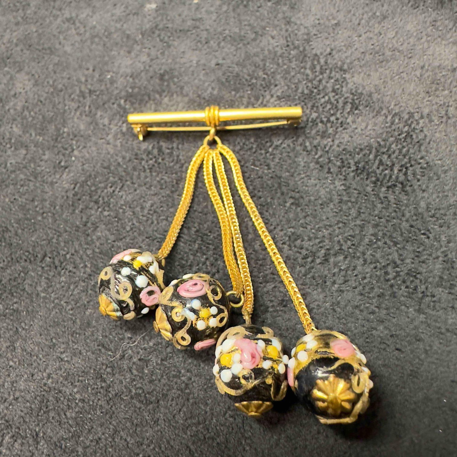 Murano Venetian Lamp Work Glass Art Black Floral Four Dangle Beads Lapel Pin F27: Murano Venetian Lamp Work Glass Art Black Floral Four Dangle Beads Lapel Pin F27. Lapel pin with a black colored glass bead with a beautiful hand painted design. The lapel pin features pink colored an