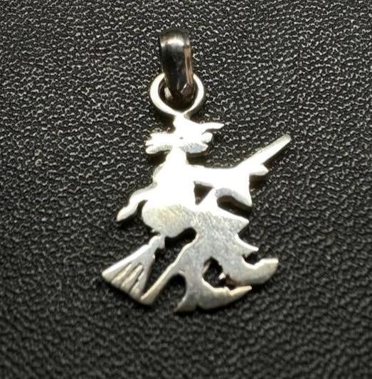 Small Sterling Witch Pendant: This piece of jewelry has been tested and researched prior to listing. Please view all our pictures they are part of our description. DETAILS: Metal - Sterling Silver Color - Silver Stones - none Hall