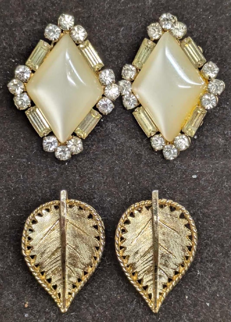 Coro Diamond Shaped Faux Pearl And BSK Gold Tone Earrings: Coro Diamond Shaped Faux Pearl And BSK Gold Tone Earrings. This lot includes: (1) 1960s Coro Diamond Shaped Clip On Faux Pearl And Rhinestone Earrings. Each is approx 1 3/8" x 1" x 1/4".