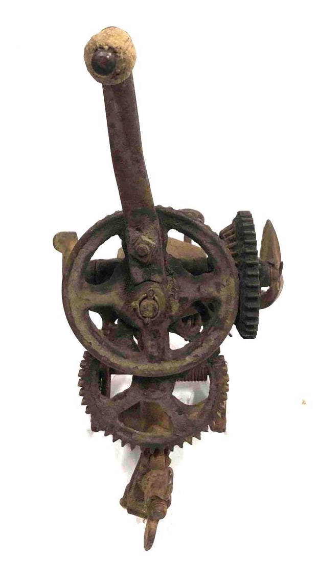 Antique McCormick Sickle Sharpener: This lot contains an antique McCormick Sickle Sharpener. It is approx BLANK and weighs about 12.2lbs. The sickle sharpener is in good used condition considering age and use. It is made of cast iron an