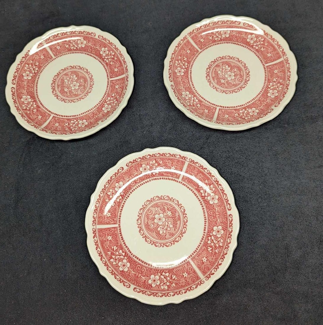 3 Syracuse Strawberry Hill Pink Salad Plates B: 3 Syracuse Strawberry Hill Pink Salad Plates B. Each of these retired china salad plates is approx 7 1/2" x 1" x 7 1/2" and the total weight is 2.20 lbs. There are some markings on the bottom.