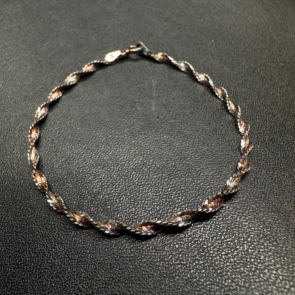 Sterling Silver Twist Chain Bracelet: This piece of jewelry has been tested and researched prior to listing. Please view all our pictures they are part of our description. DETAILS: Metal - Sterling Silver Color - Silver Stones - none Hall