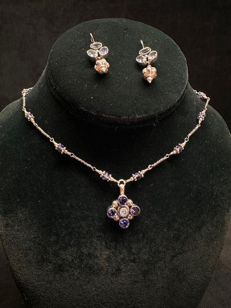 Indian Sterling Tanzanite Necklace & Earrings: This piece of jewelry has been tested and researched prior to listing. Please view all our pictures they are part of our description. DETAILS: Metal - Sterling Silver Color - Silver Stones - Tanzanite