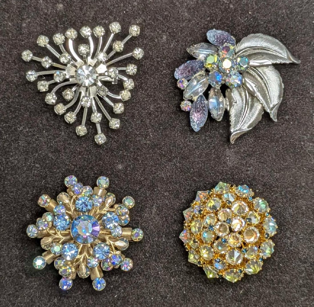 Vintage Unmarked Rhinestone And AB Crystal Brooch Pins: Vintage Unmarked Rhinestone And AB Crystal Brooch Pins. This lot includes: (1) Unmarked Gold Tone AB Crystal Brooch. This is approx 2" x 2" x 1". Has some wear on the back. (1) Unmarked Si