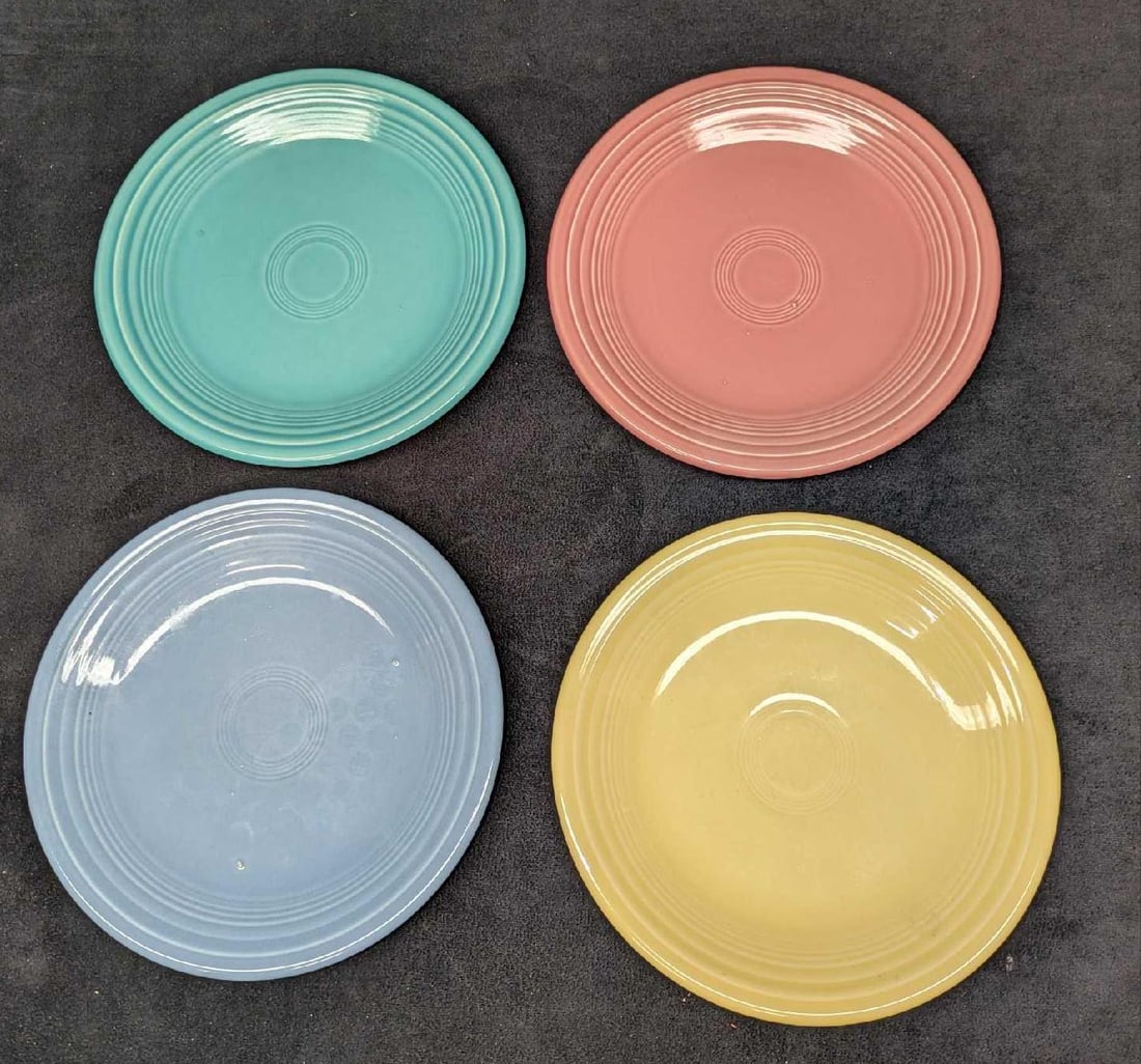 4 Fiestaware Salad Plates: 4 Fiestaware Salad Plates. From 1997. Each plate is approx 7 1/4" x 7 1/4" x 3/4" and the total weight is 3lbs. The plates have small imperfections (glaze pops) and light scratches from use. Please se