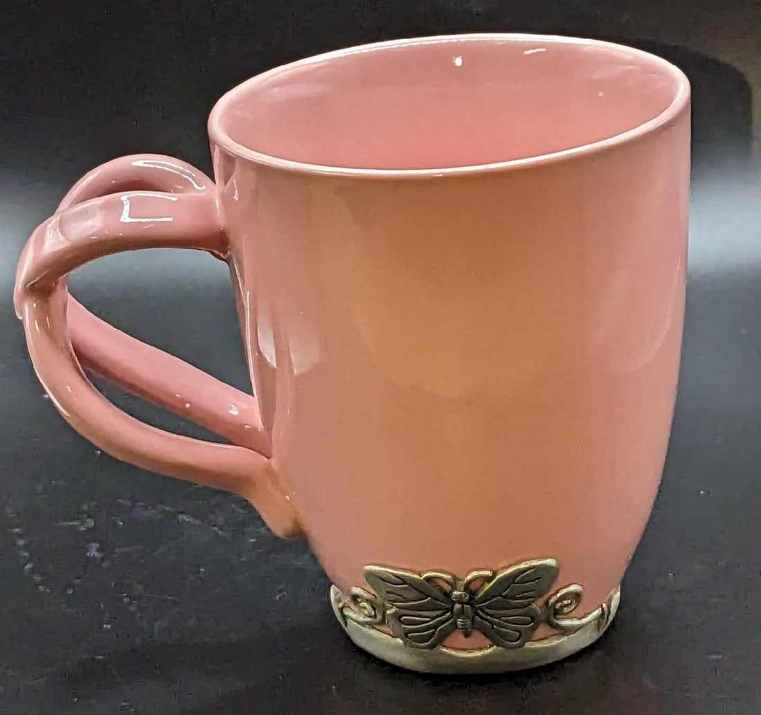 Neiman Marcus Arthur Court Breast Cancer Mug: Neiman Marcus Arthur Court Breast Cancer Mug. Arthur Court Special Pink With Butterflies Breast Cancer Mug For Neiman Marcus. The mug is made of ceramic while the butterflies are pewter. Dishwasher sa