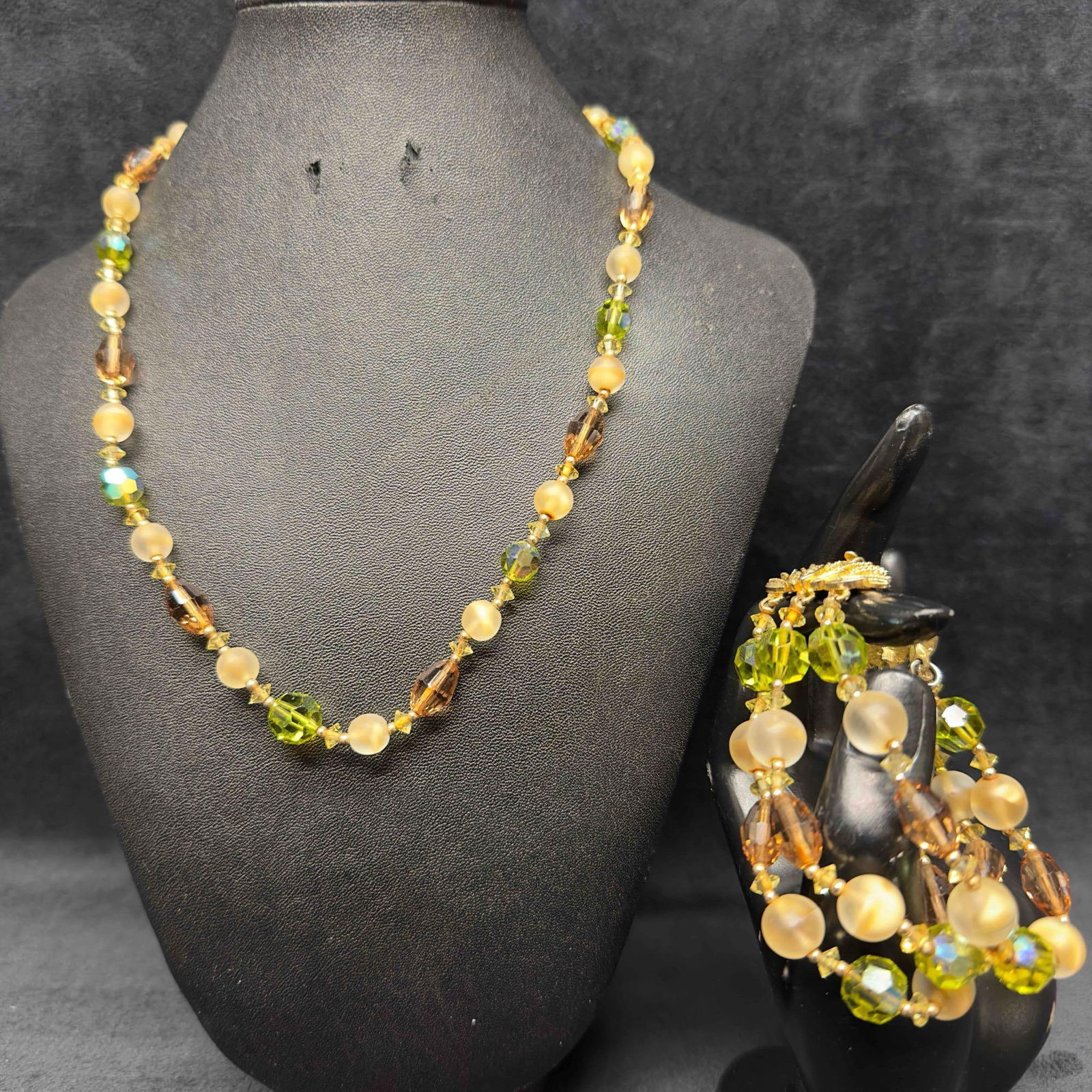 Coro Amber Green Frosted Clear Glass Beaded Necklace and Bracelet Set H79: Coro Amber Green Frosted Clear Glass Beaded Necklace and Bracelet Set H79. Necklace and bracelet with amber, green, and clear frosted colored glass beads with beautiful designs. The necklace features