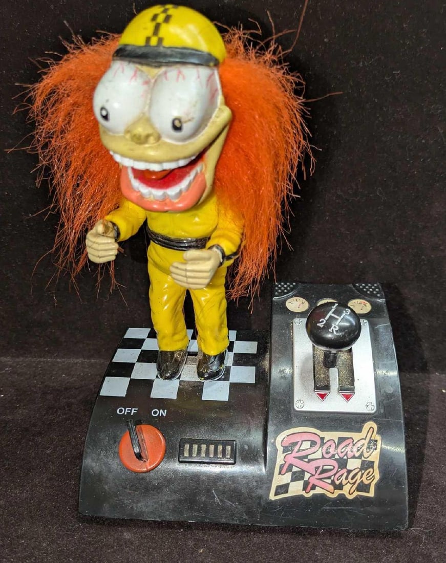 Road Rage Animated Wild Toy That Makes Sounds And Animates: Road Rage Animated Wild Toy That Makes Sounds And Animates. This crazy figure makes crazy car sounds depending on what you shift the "car" and moves around as it does. This is approx 5 1/8" x 3 3/4" x