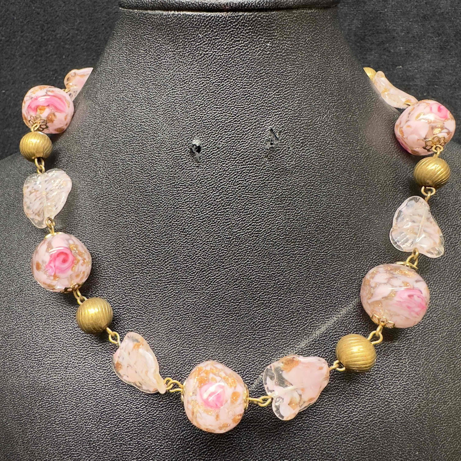 Venetian Murano Lamp Work Art Glass Pink Flower Floral Copper Accent Beaded Necklace D46: Venetian Murano Lamp Work Art Glass Pink Flower Floral Copper Accent Beaded Necklace D46. Necklace with pink colored glass beads with beautiful designs on each. The necklace features floral accents. T