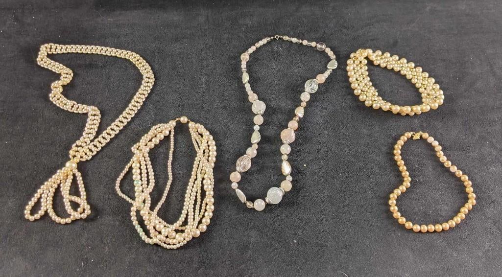 Pearl Faux Necklaces: Pearl Faux Necklaces. These are faux pearl necklaces to add to your collection. These pearls are faux so you can wear them anywhere and save your real pearls for special occasions. There are five neck