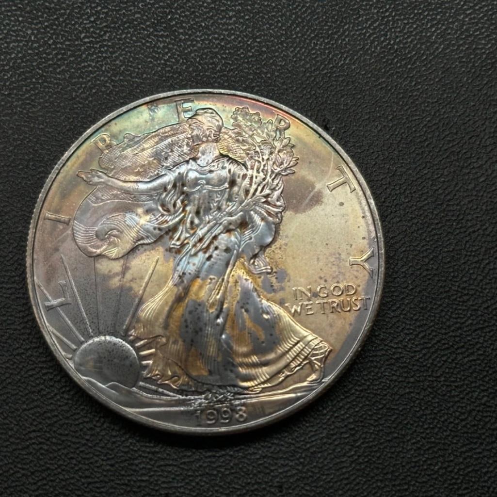 Toned .999 Silver American Silver Eagle Coin 1998: These coins have been tested and researched to the best of our ability prior to listing. Please view photos, as they are a part of the condition. DETAILS: Metal - .999 Pure Silver Tested - Yes Size -