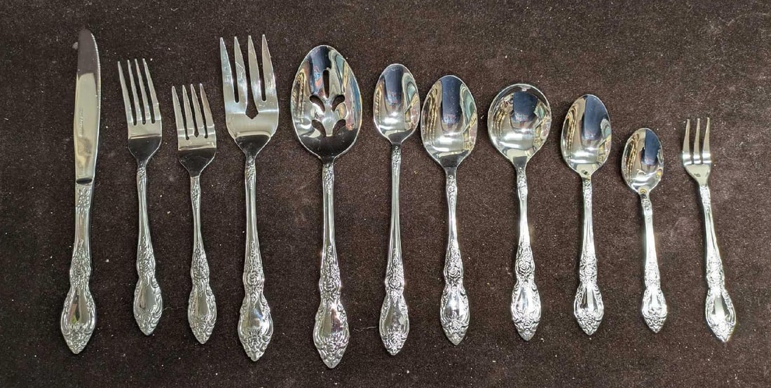 Set Of 83 Pieces Of Stainless Steel Floral Design Silverware A: Set Of 83 Pieces Of Stainless Steel Floral Design Silverware A. This lot includes: (10) Dinner Knives. Each is approx 1/2" x 1/8" x 9". (10) Dinner Forks. Each is approx 1" x 3/4" 