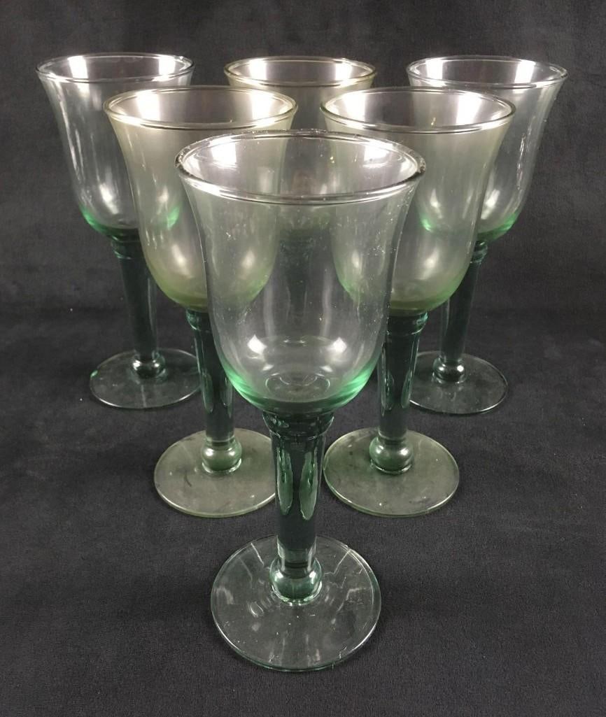Vintage Set of 6 Tulip Shaped Wine Glasses with Thick Stems: Vintage Set of 6 Tulip Shaped Wine Glasses with Thick Stems. This set of wine glasses is in fair condition. One of the glasses has a small chip in the base, otherwise, the glass is in good condition. 