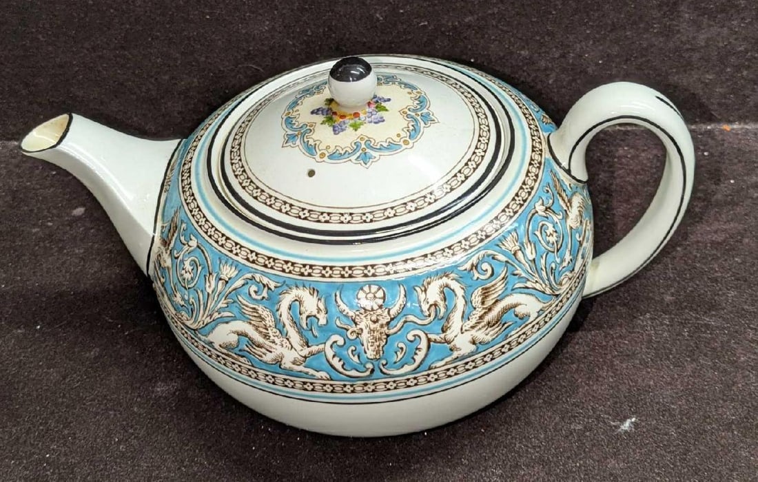 Wedgewood Florentine Turquoise Teapot With Lid: Wedgewood Florentine Turquoise Teapot With Lid. This china teapot is approx 9" x 6" x 5" and it weighs 1.24lbs. The inside has some stains from use and age. Please see the images as they are part of t