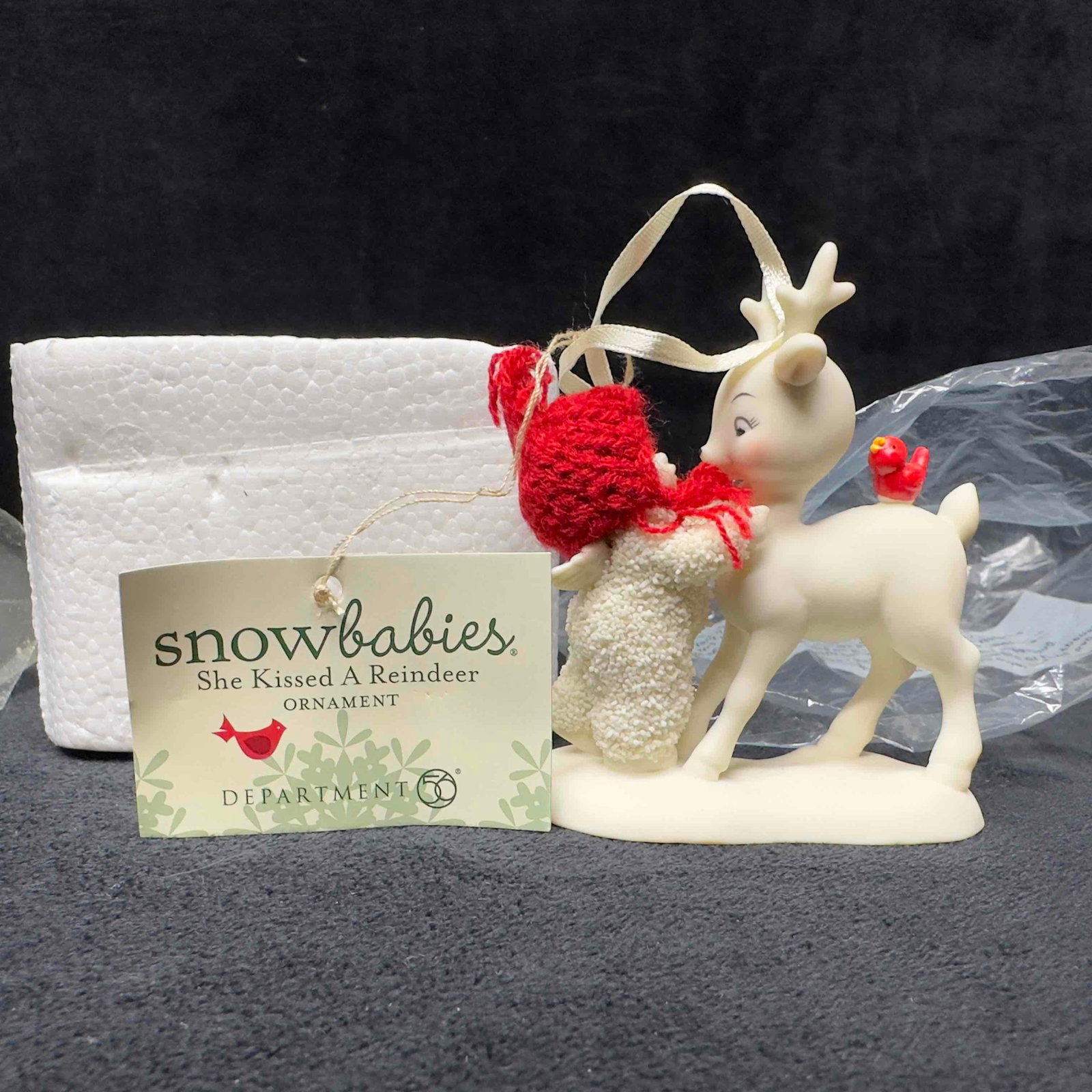 Snowbabies Department 56 She Kissed A Reindeer Porcelain Christmas Snow Babies Ornament: Snowbabies Department 56 She Kissed A Reindeer Porcelain Christmas Snow Babies Ornament. Original tag still intact. This item is in good pre-owned, previously displayed condition with light wear, and 