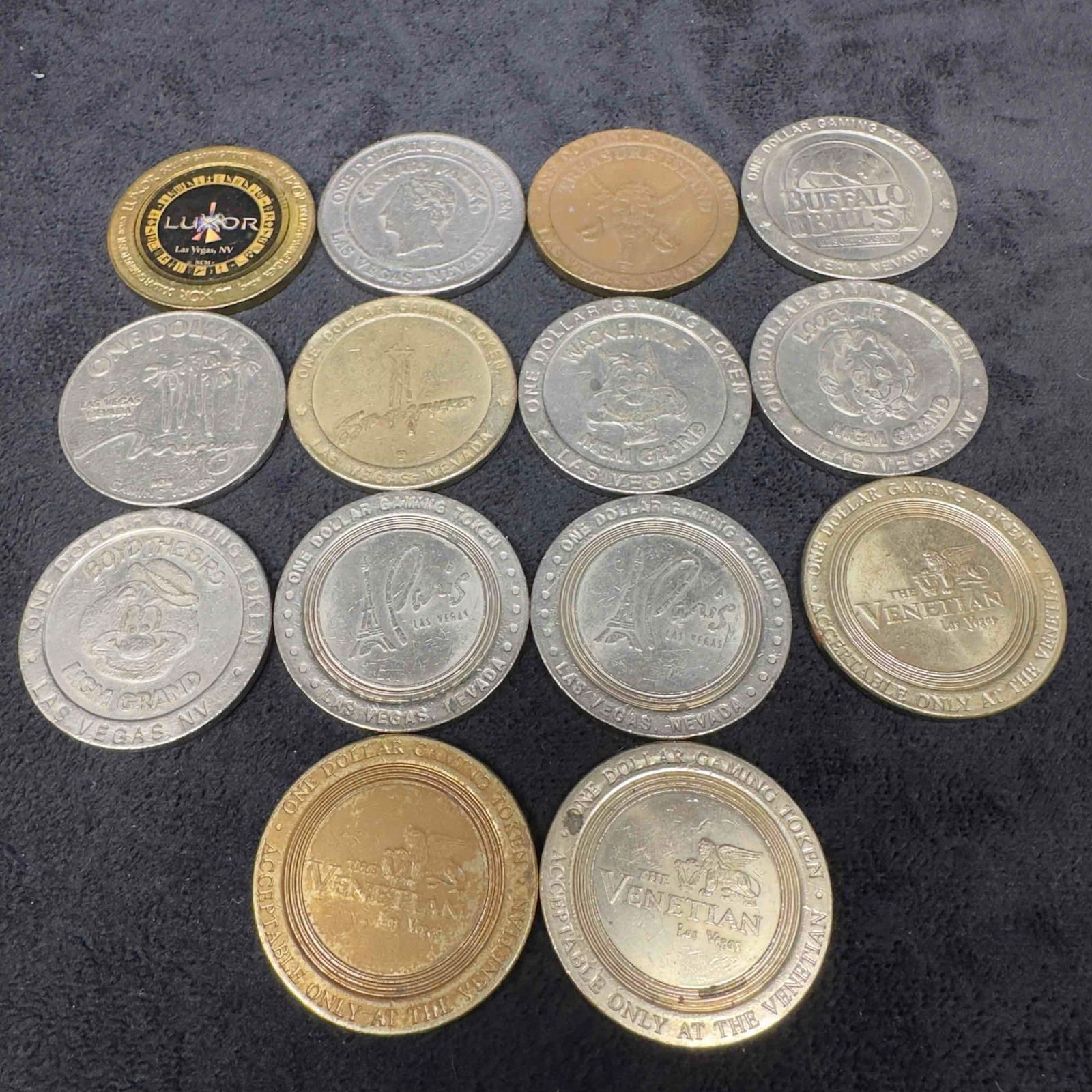 Las Vegas One Dollar Gaming Token Coin Set Lot of 14 Coins MGM Grand Luxor Paris Caesars Palace (1 of 6)