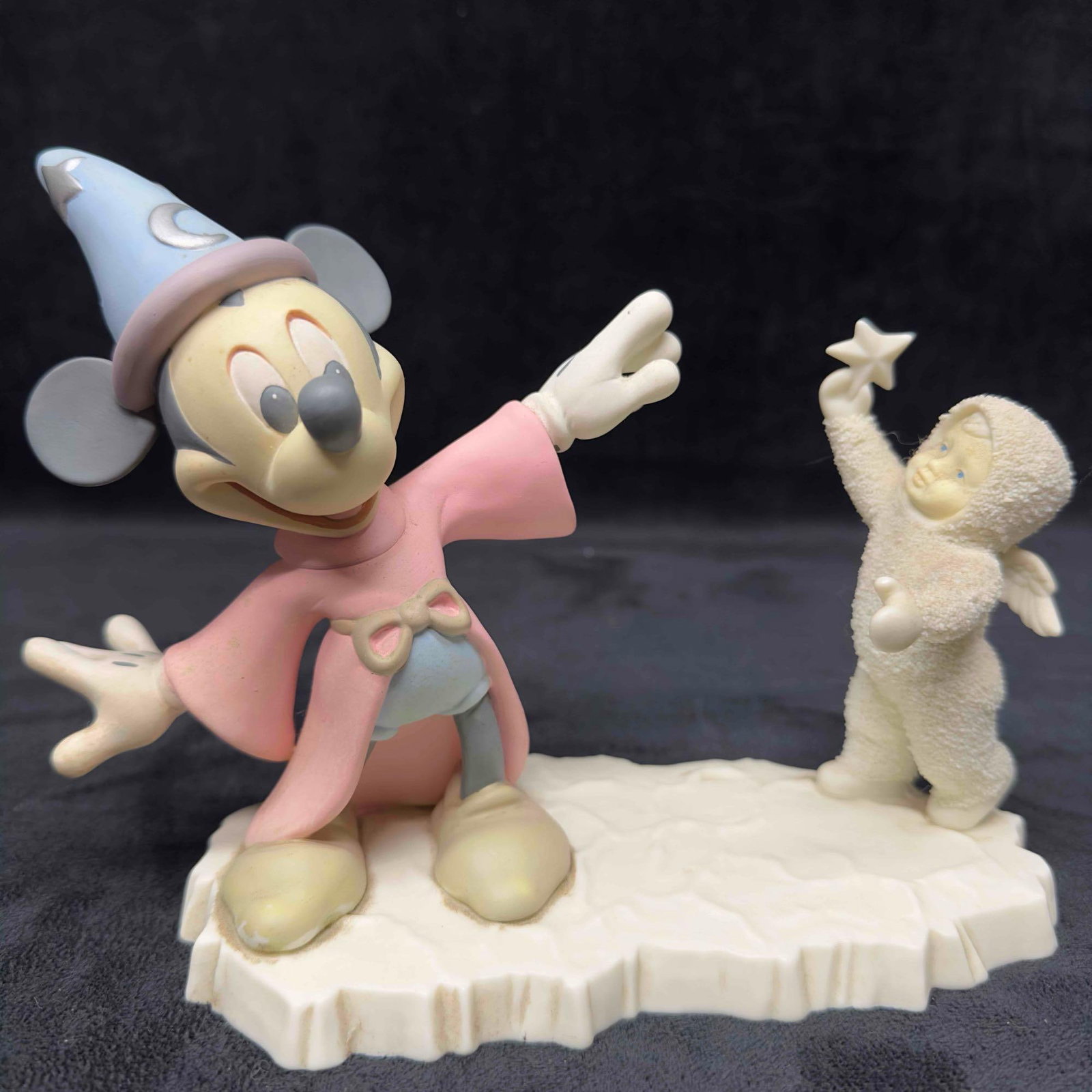 Disney Department 56 Snowbabies Mickey's New Friend Sorcerer Mickey Mouse 1994: Disney Department 56 Snowbabies Mickey's New Friend Sorcerer Mickey Mouse 1994. No noticeable chips or cracks, light marks throughout the figure. Light stains, marks, and dust on the figure. This 