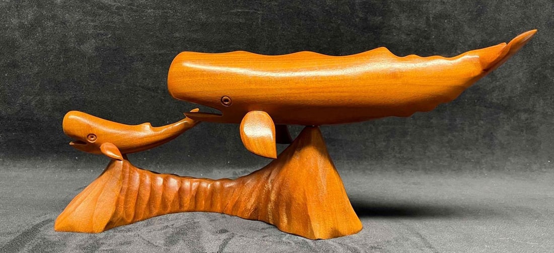 Wood Whale Sculpture Mother & Baby: This lot contains a Wood Carving Whale Sculpture Mother & Baby. It is approx 13 3/4" x 2 1/2" x 6 3/4". Total weight is 1.3lbs. Overall the Wood Carving is in good used condition with some light scuff