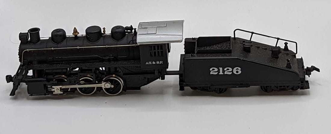 Bachmann #50602 Usra 0-6-0 W/Smoke & Slope Tender: Bachmann #50602 Usra 0-6-0 W/Smoke & Slope Tender. HO Scale. The engine is approx 5 1/2" x 1 1/2" x 2". The tender is approx 4 1/2" x 1 1/2" x 1 3/4". The total weight is 0.51lb. Untested. Both have s